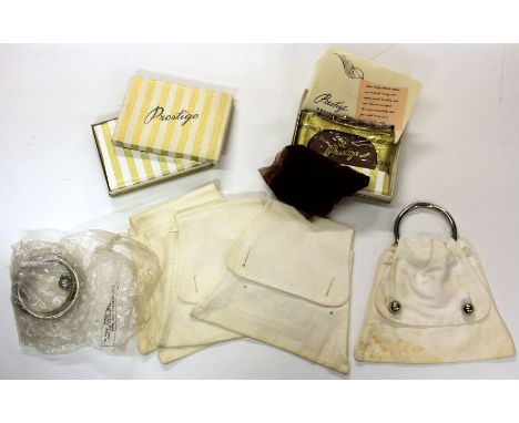 A set of 1920s ladie's white cotton day bags with interchangable handles and two boxes of vintage stockings. Prov.Colleen Pea