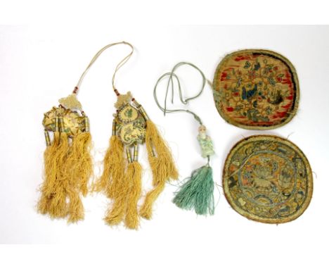 Two small panels of 19th century Chinese forbidden stitch embroidery, a 19th century porcelain tassel and two further mid 20t