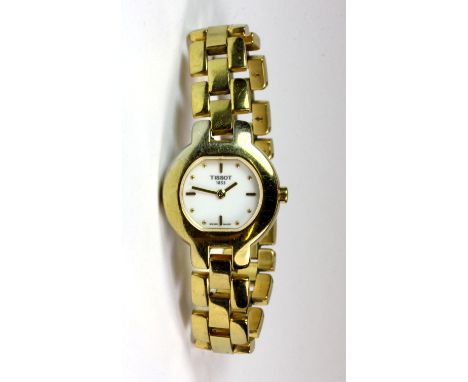 A gold plated Tissot lady's wrist watch.