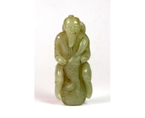 A 19th/early 20th century Chinese mixed colour jade figure of a fisherman sitting on a basket, H. 8cm.