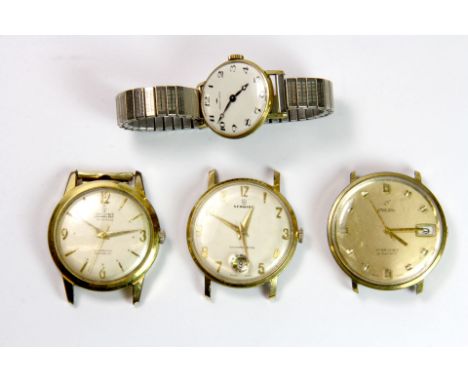 Four vintage wristwatches.