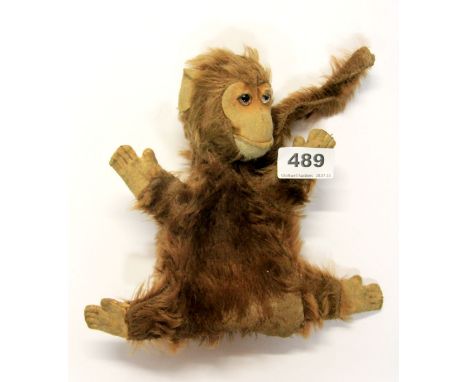 A vintage monkey hand puppet, H. 22cm.