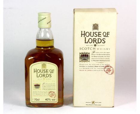 A bottle of vintage House of Lords Scotch whisky bearing a Margaret Thatcher signature on the label.