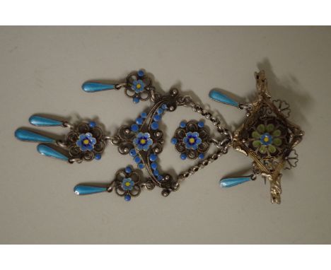 A Continental .830s brooch, having blue enamel forget-me-not flowers on pendant drop, 9cm. 
