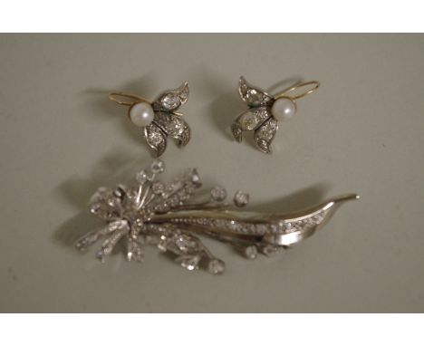 A floral spray white sapphire brooch; together with a pair of white sapphire and pearl earrings. 