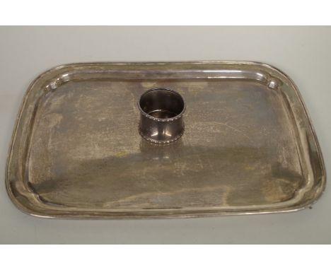 A silver rectangular tray, by&nbsp;W I Broadway &amp; Co, Birmingham 1970, 29.5 x 20.5cm; and a silver napkin ring, 399g. 