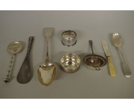A Victorian silver fiddle pattern serving spoon,&nbsp;London 1855; together with seven other silver or metal items, 192g weig