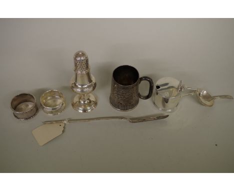 A small selection of silver items, to include; a Georgian silver castor, 14cm; a Georgian silver caddy spoon, 262.5g; togethe