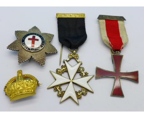 Two silver and enamel medals, a silver and enamel brooch marked In Hoc Signo Vinces and another brooch