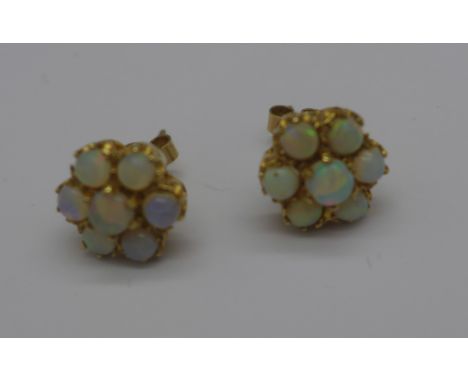 A pair of 9ct gold and opal cluster earrings