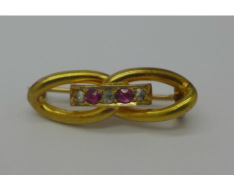 A yellow metal old cut diamond and ruby brooch, 3.7g