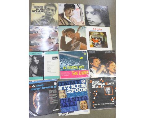 A quantity of 33rpm LP records including Tom Lehrer, Simon & Garfunkel, Sidney Bechet, Ian Dury, New Boots and Panties, Joan 