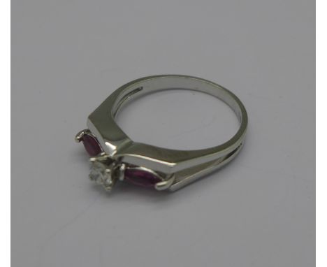 A 14ct white gold, diamond and ruby ring, 4.3g, Q