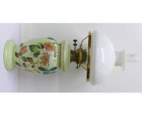 A Victorian glass oil lamp decorated with flowers, a chimney and white opaque shade by Wright & Butler, Birmingham
