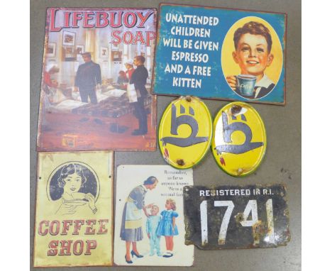 A pair of oval metal and enamel signs and five other metal signs