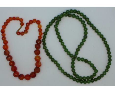 A jade bead necklace and a faceted bead necklace