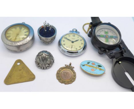 A silver cased pocket watch, one other pocket watch, a compass, a Pleasley Colliery token, etc.