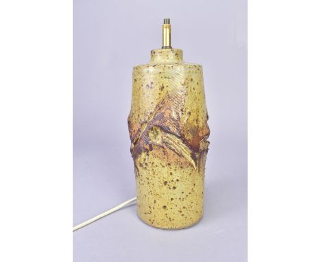 COLIN KELLAM (born 1942); a stoneware lamp base with deeply carved surface covered in oatmeal and iron glaze, impressed mark,