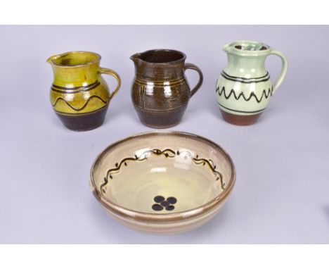 SID TUSTIN (1914-2005) for Winchcombe Pottery; two slipware jugs and a bowl, impressed ST and pottery marks, and a John Forst