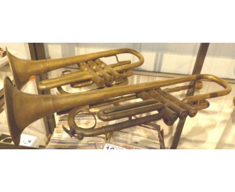 Antique brass trumpet with 48,47 and 46 to valves and an anchor, and a cornet with 108346 to central valve 