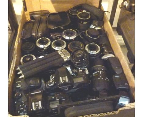 Box of camera bodies and lenses
