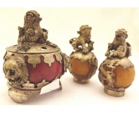 Pair of white metal stick heads with hardstone ball and a matching lidded pot 