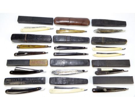 A collection of fourteen predominantly early 20th century horn and ivory handled razors including examples by Thomas W Ward &