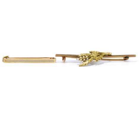 A 15ct yellow gold bar brooch set with platinum engine turned decorated band, inscribed 'June 1930' to the back, length 4cm, 