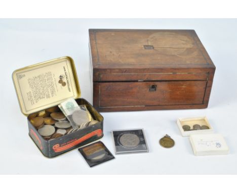 A collection of British pre and post 1920 mixed denomination coinage with some coppers, in a 19th century mahogany box.