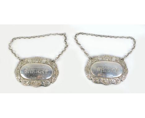 LAWRENCE R WATSON & CO; a pair of Elizabeth II hallmarked silver decanter labels inscribed 'Whisky' and 'Sherry', the borders