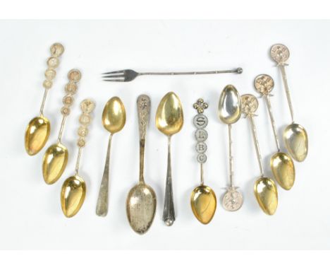 A set of four Chinese white metal spoons, inscribed 'Y.L.B.C.' with faux bamboo shafts, three further teaspoons for the same 