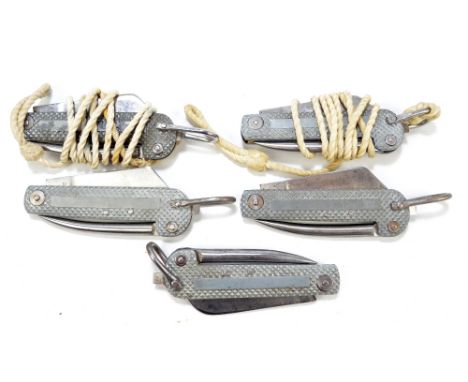 Five large checkered bodied clasp knives, each with single blade and hinged spike with ring loop attachment, length approx 12
