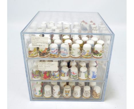 A collection of sets and part sets of Caverswall ceramic thimbles including annual Christmas thimbles from 1977-1993 inclusiv