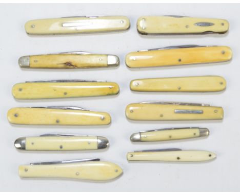 A collection of various ivory, ivorine and antler bodied pen knives including double bladed examples by Southern & Richardson