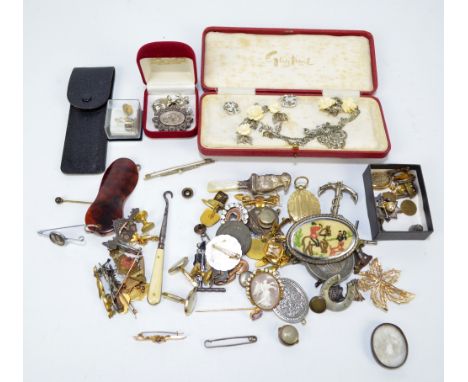 A collection of mixed costume jewellery to include a pair of 9ct yellow gold engine turned cufflinks, approx 5.80g, and furth