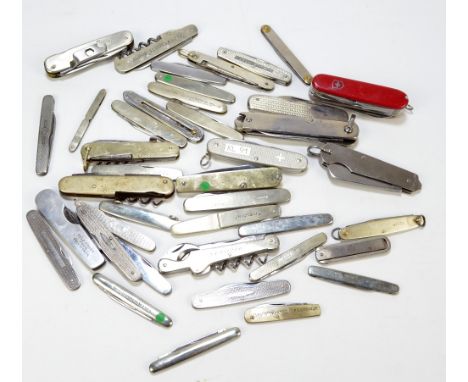 A collection of forty predominantly steel bodied multi, double and single bladed pen knives including examples by Rodgers, Ne