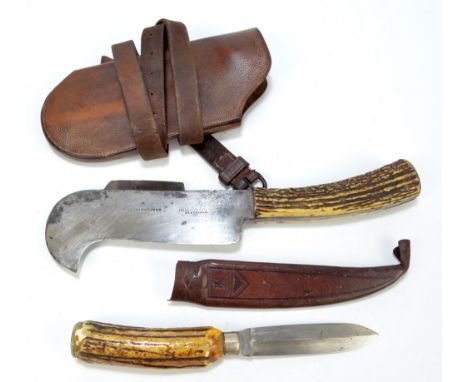 A large Milton hatchet by Lockwood Bros of Sheffield with stag antler handle, shaped blade and leather scabbard and a further