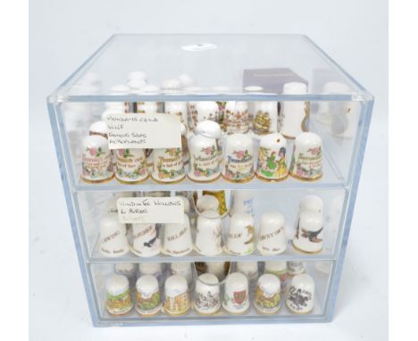 A collection of sets and part sets of Caverswall ceramic thimbles including set of seven 'Monday's Child', famous ships, Wind