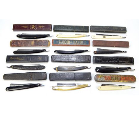 A collection of twelve late 19th/early 20th century razors including horn examples by Lockwood Bros, T Heathcote & Wilkinson,