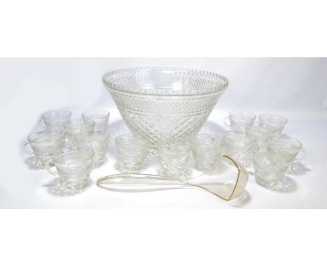 A clear glass punch bowl with fifteen matching cups and a clear plastic ladle, bowl diameter 35cm. CONDITION REPORT: Usual su