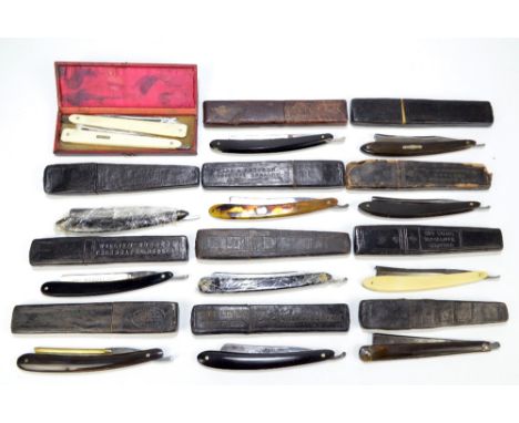 A collection of thirteen late 19th/early 20th century razors including a pair of ivory handled examples by Shepherd, horn han