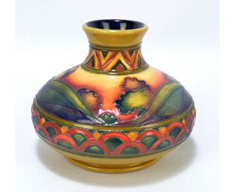 MOORCROFT; a boxed 'Second Dawn' pattern tube lined decorated squat vase adapted from a 1928 designer William Moorcroft by de