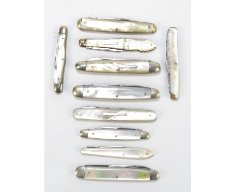 Seven mother of pearl bodied double bladed pen knives including an example by Hunter & Son of Sheffield, JWM Meeson, one insc