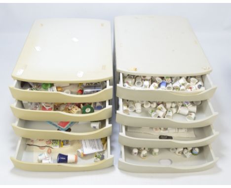 A large quantity of miscellaneous ceramic and other thimbles including souvenir and crested examples, floral and bird example