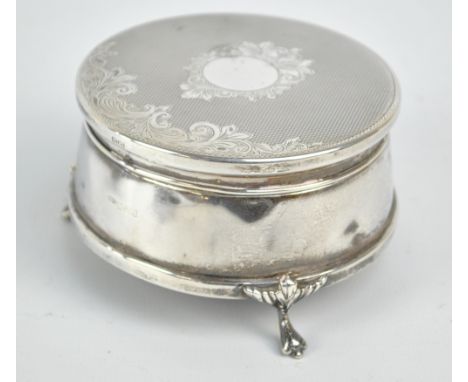 W I BROADWAY & CO; an Elizabeth II hallmarked silver circular jewellery box with engine turned and floral decorated hinged li