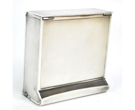 COHEN & CHARLES; an unusual George V hallmarked silver portable engine turned decorated cigarette dispenser with twin hinged 