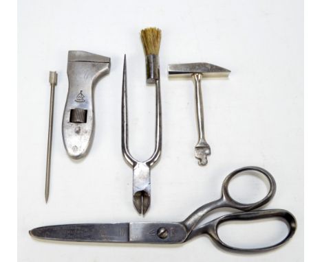 A group of collectors' items including an unusual 'Strad' pencil with marbled body and hinged knife, a champagne tool by Broo