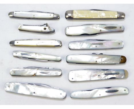 A collection of eleven late 19th/early 20th century mother of pearl bodied pen knives including a triple bladed example by Br