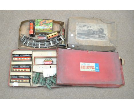 A boxed early 20th century British made tinplate train set and a boxed Chad Valley train set (lacking loco) (2).