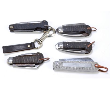 Five military clasp knives with moulded checkered pattern bodies with single blade, tin opener and marlin spike including Geo